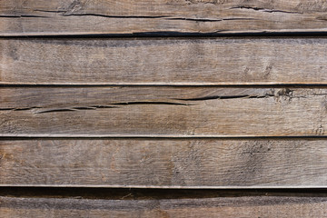 Fototapeta premium Old dark weathered wooden wall. Wooden texture background