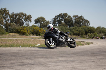 Motorcycle competition on a race track on a training day