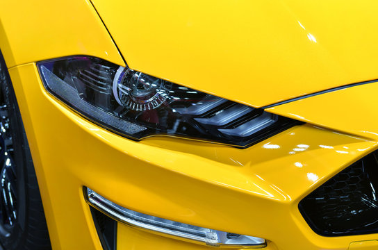 Detail On One Of The LED Headlights Yellow Car.