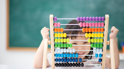 Students boy and girl leaning math in the class room Montessori - 258455267
