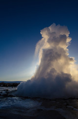 Erupting geyser in Iceland during winter
