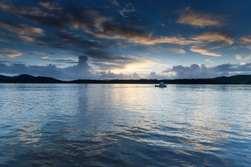 Early Morning Clouds and Reflections on the Bay