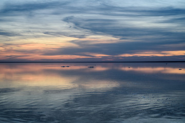 Obraz premium Salt lake. Evening sunset with beautiful sky and water.