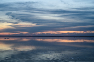 Fototapeta premium Salt lake. Evening sunset with beautiful sky and water.