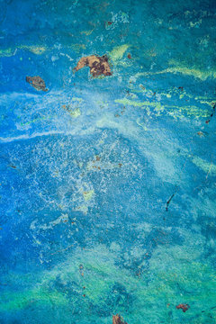 A background made of blue azurite that is heavily weathered with lots of texture.
