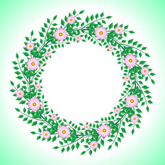 round wreath of flowers and green branches with leaves