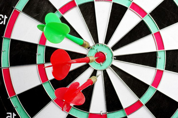 Target and darts arrows hitting the target