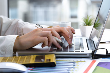 female hand with objects for doing business in the office