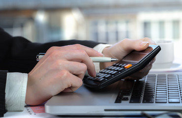 female hand with objects for doing business in the office