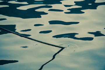 Beautiful reflection of the details of yachts in the port of Los Gigantes. Tenerife. Canary...