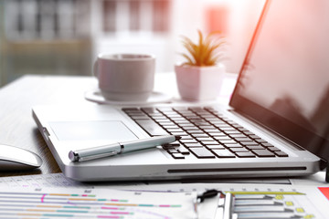 Women's hands with items for business on the table
