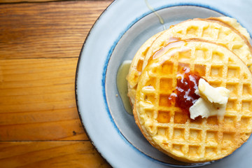 Classic waffles with butter and honey