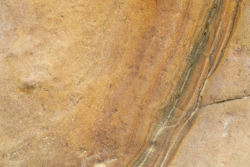 Close up marble texture detailed of natural yellow rock background.