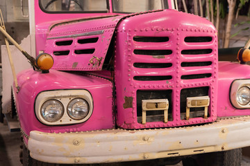 Vintage pink truck design.