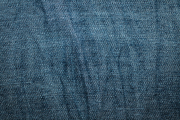 Blue denim texture, background, abstraction. Textile space for text.