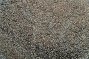 Brown with dark grey color natural rock, stone texture background.