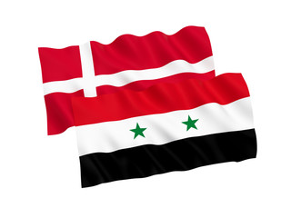 National fabric flags of Denmark and Syria isolated on white background. 3d rendering illustration. 1 to 2 proportion.