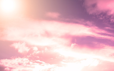 Fabulous sunset on a blue sky with white clouds. Background, texture.