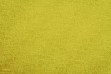 Fototapeta premium Yellow fabric texture, background, abstraction. Space for text. Matte coating