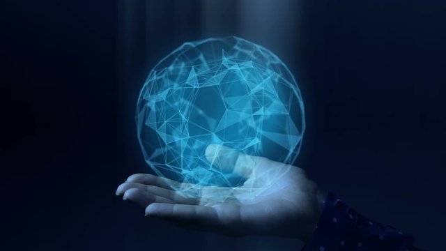 Blue hologram magic sphere rotating in woman hands. Futuristic network concept.