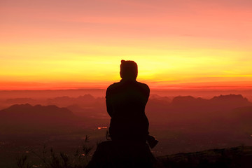 Black silhouette in sunset, Phu Kradueng National Park, Loei,Thailand 