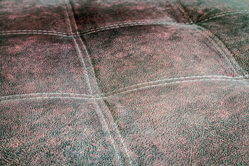contrast stitching on the upholstery of the sofa. background