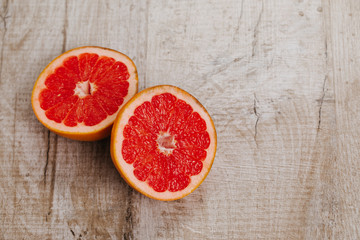 Fototapeta na wymiar Pink ripe grapefruit slice on white isolated background