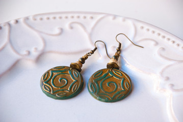 Ethnic green gold earrings. Handmade jewelry polymer clay. Fashionable bijouterie.