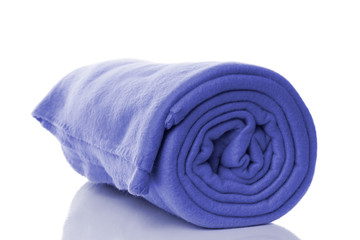 blue fleece blanket with reflection on white