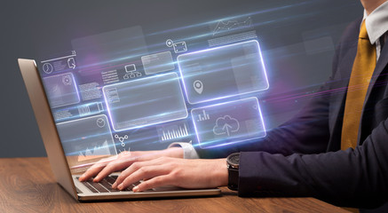 Hand typing on laptop with online accounting system concept
