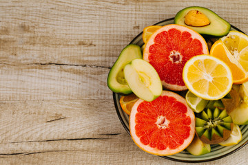 Healthy fresh fruit  on wooden background. Top view. 