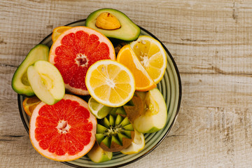 Healthy fresh fruit  on wooden background. Top view. 