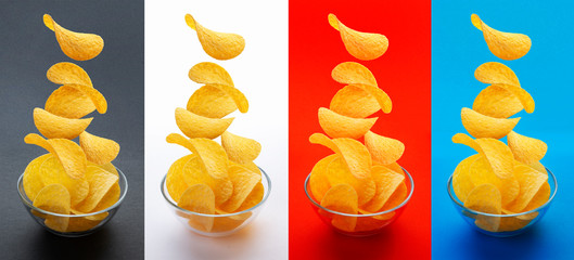Potato chips falling into glass bowl isolated on white background, flying potato crisps, different...