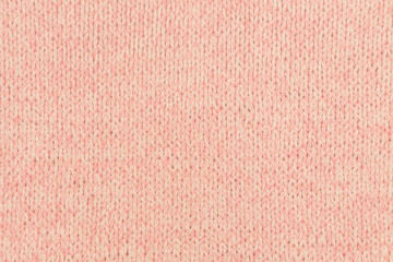 beautiful pink knitted fabric on the background
