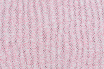 Fototapeta premium beautiful pink knitted fabric on the background