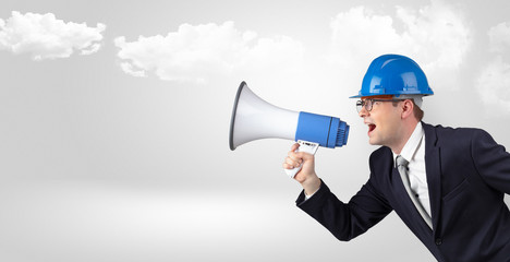 Fototapeta premium Young supervisor architect yelling to far big city panorama 