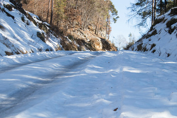 Dangerous mountain frozen road during winter