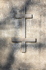 Background texture in the form of an ancient cross