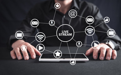 Man with tablet. Live stream concept