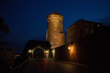 buildings in Krakow at night by the light of lanterns