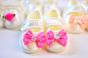 First footwear for baby girl princess background
