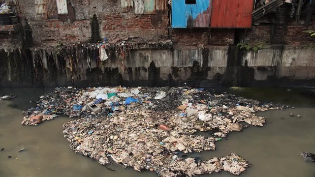 Dirty river in Dharavi slums. Mumbai. India.