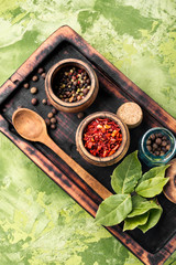 Spices and herbs on kitchen table