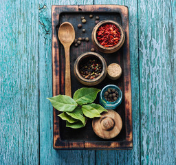 Spices and herbs on kitchen table