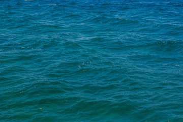 blue water sea surface with small waves 