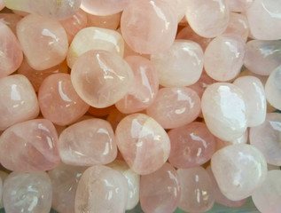 Fototapeta na wymiar Beautiful pink quartz crystal stones