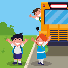 happy little school kids in the bus stop