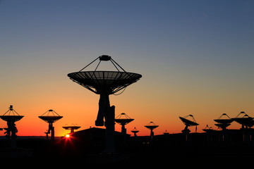 Observatory equipment, silhouette at sunrise