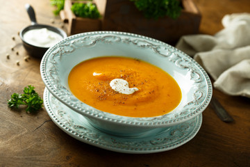 Homemade pumpkin soup with cream