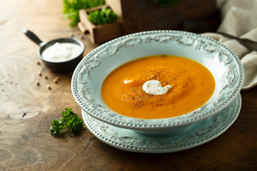 Homemade pumpkin soup with cream